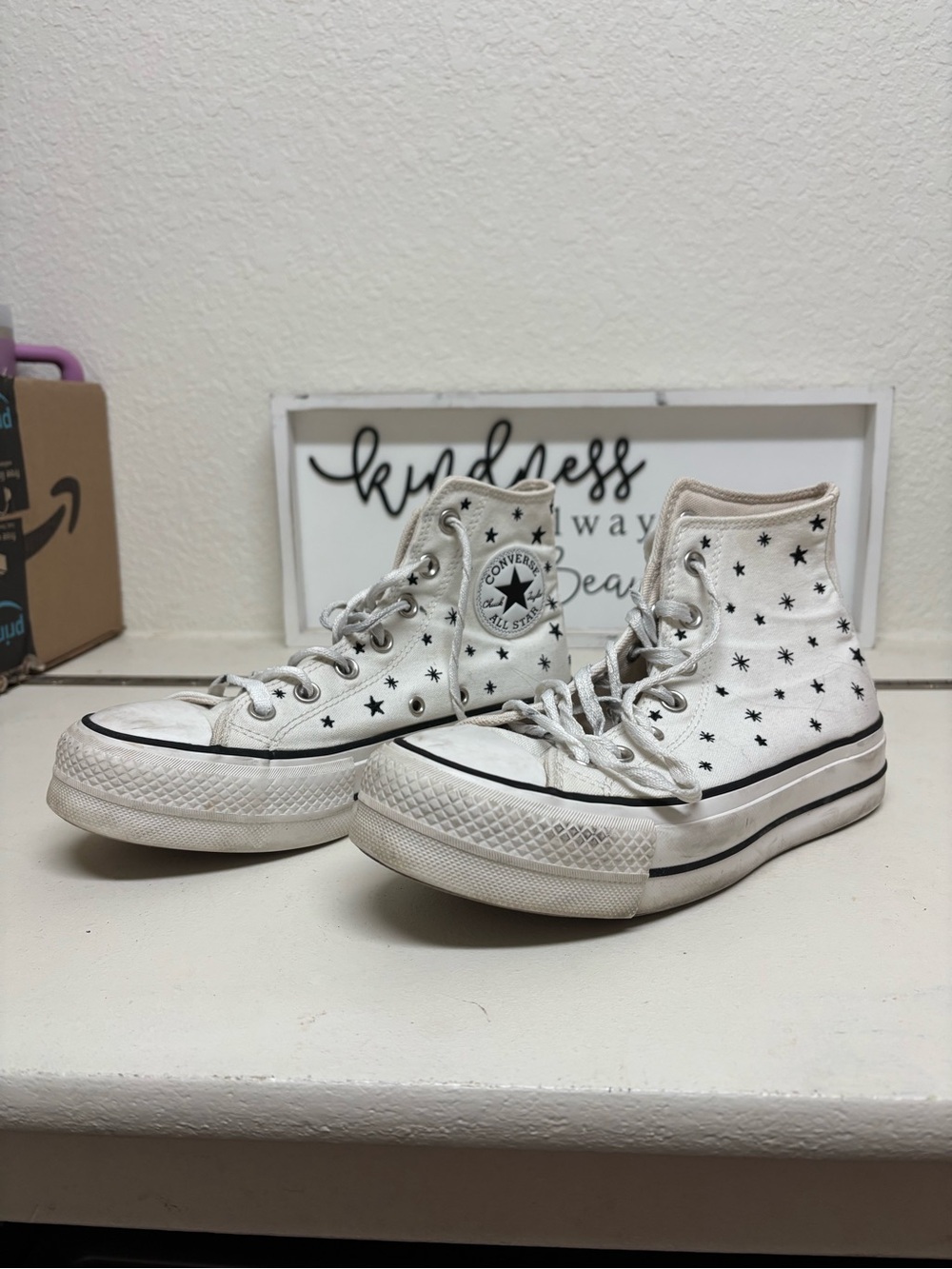 Converse Women’s White High-Top Sneakers with Black Star Print
